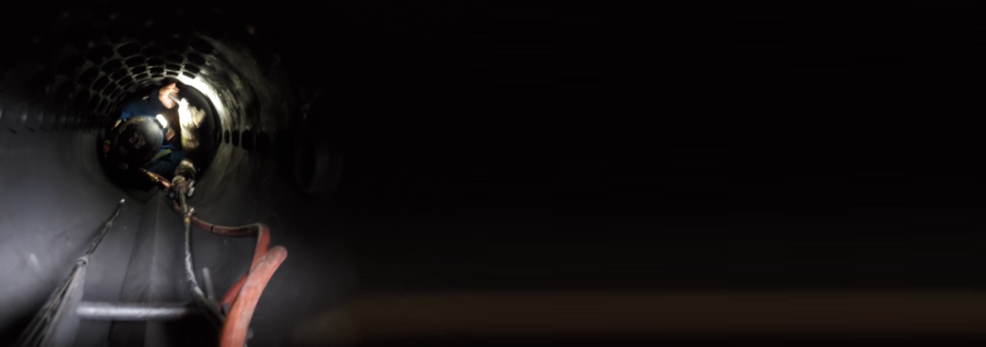 interior-view-of-mud-drum-worker-identifying-and-prepping-tube-for-repair HERO